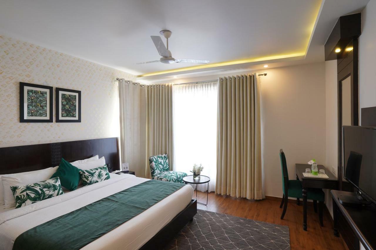 Rockland Hotel, C.R Park Nuova Delhi Esterno foto