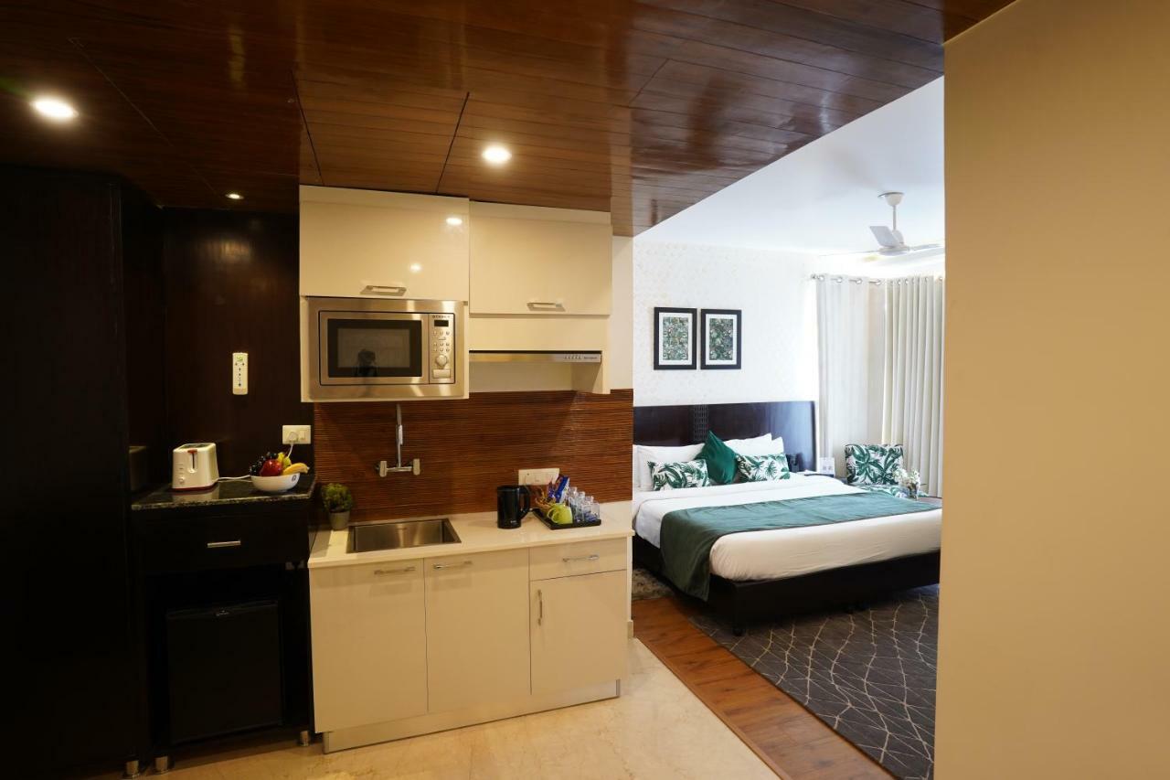 Rockland Hotel, C.R Park Nuova Delhi Esterno foto